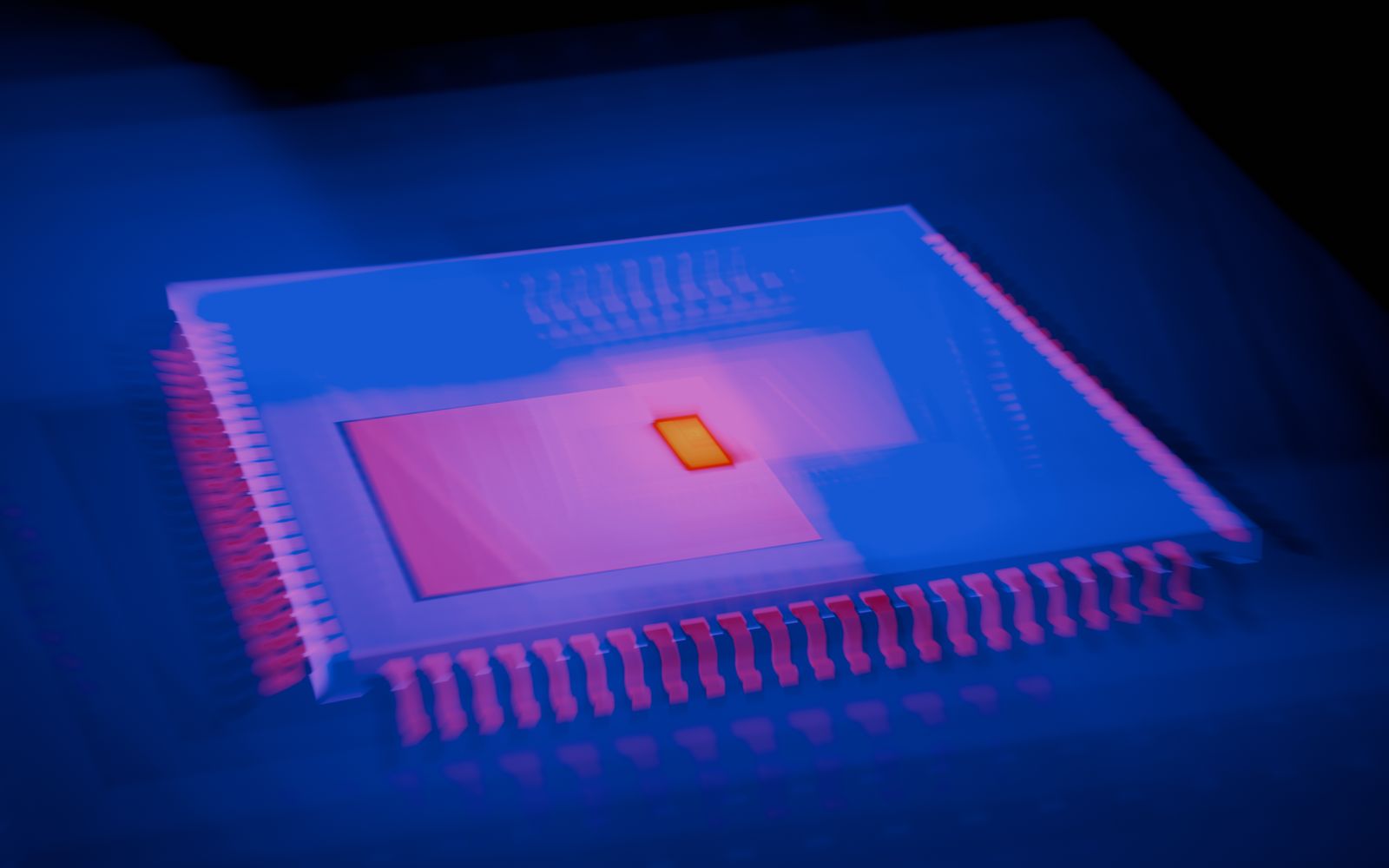 Blurred abstract image of a microchip with heatmap colors highlighting technological innovation.
