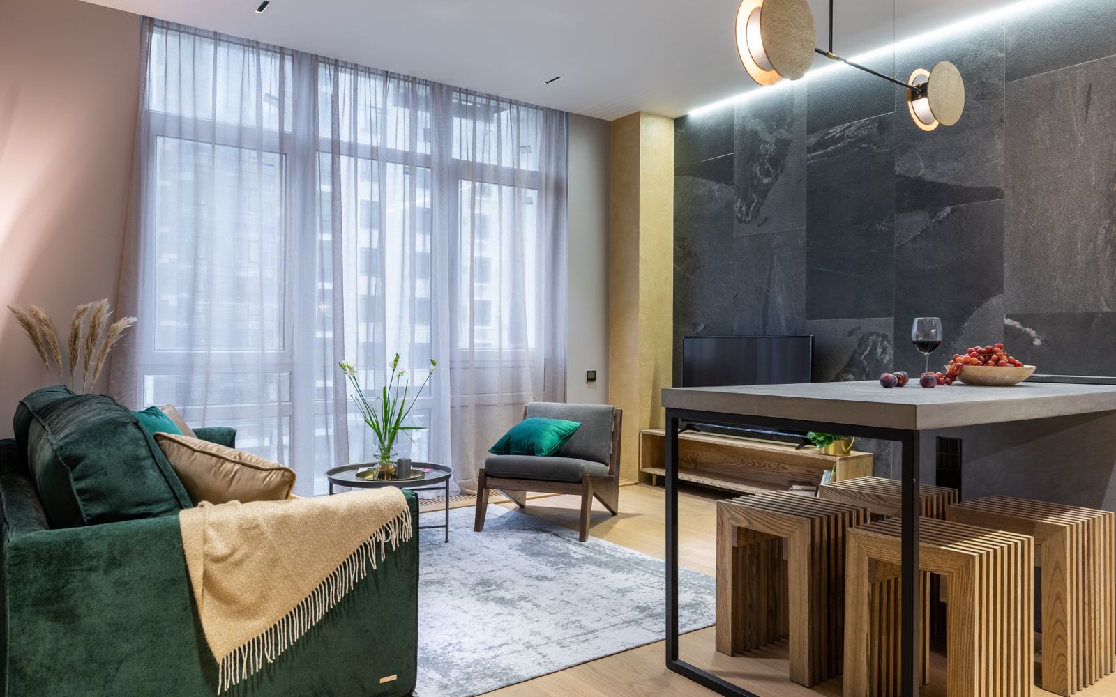 Sleek and luxurious living room with modern furnishings and elegant decor.